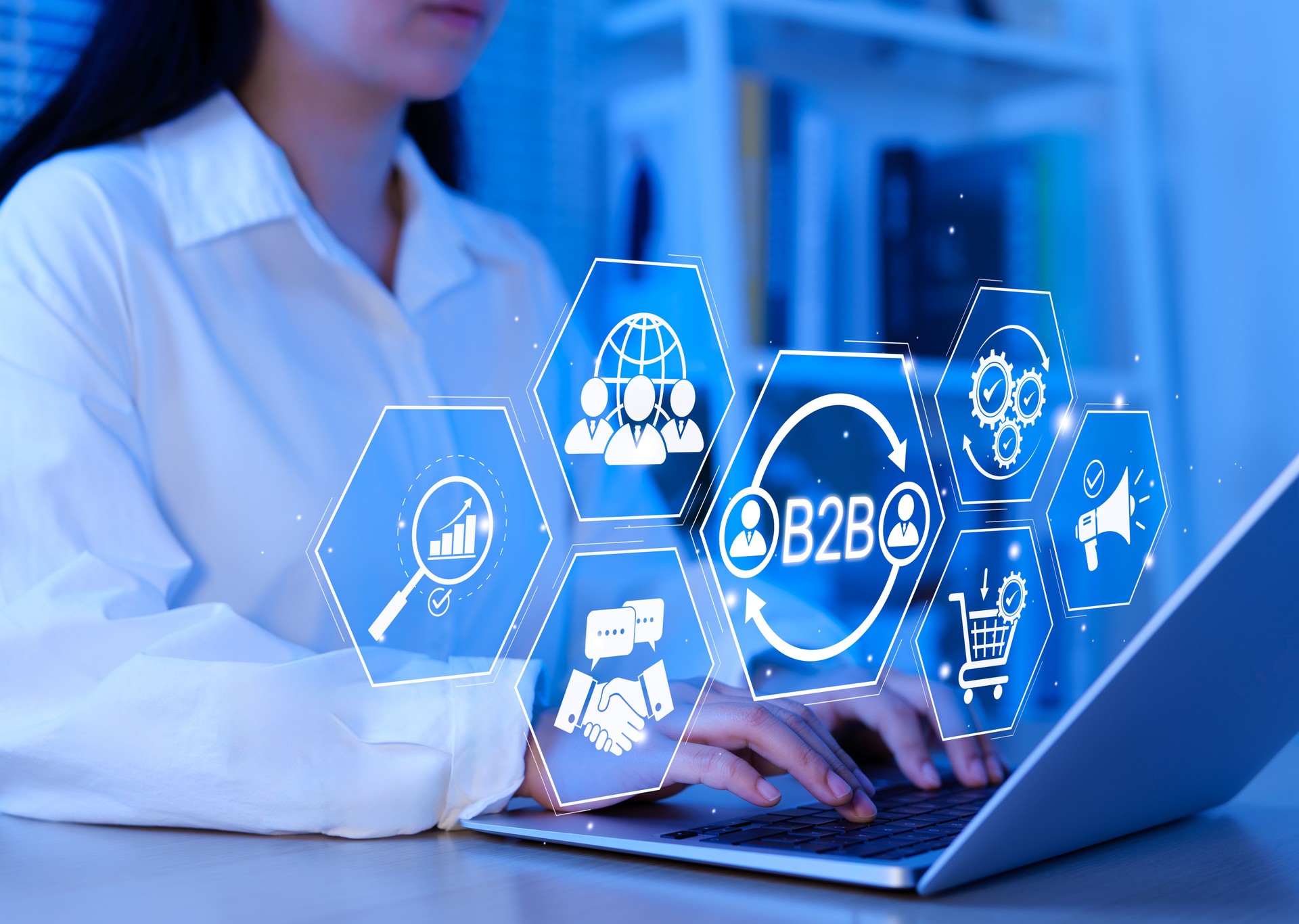 B2B business strategy concept. Business professional working with B2B interface on laptop, conceptualizing strategy, partnership, targets in business to business services. E-commerce, B2B Marketing, B2B business strategy concept. Business professional working with B2B interface on laptop, conceptualizing strategy, partnership, targets in business to business services. E-commerce, B2B Marketing,